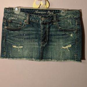Denim destructed mini skirt